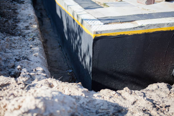 Professional Waterproofing technician working in Rock Hill, SC